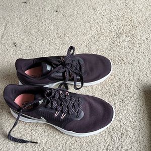 Dark purple Nike sneakers. Size 7. Very little previous wear, perfect condition